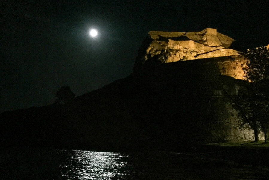 Sailing at night near Corfu Old Fortress