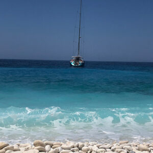 S/Y Morpheus moored near beautiful beach with white pebbles S/Y Morpheus moored near beautiful beach with white pebbles